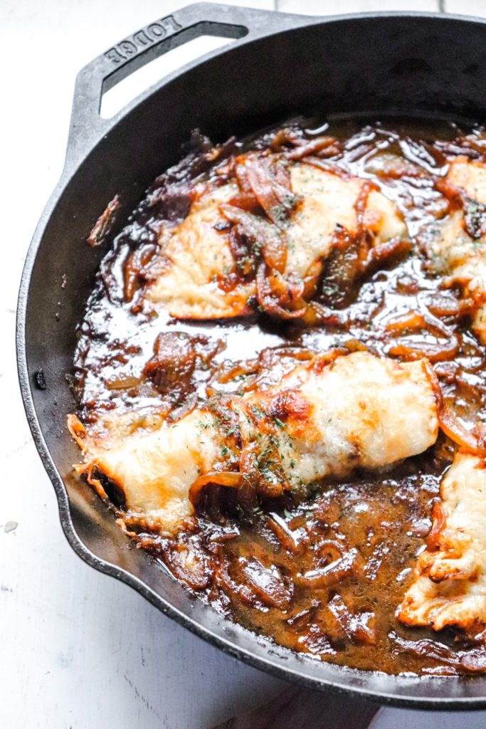 French onion chicken in a cast iron skillet