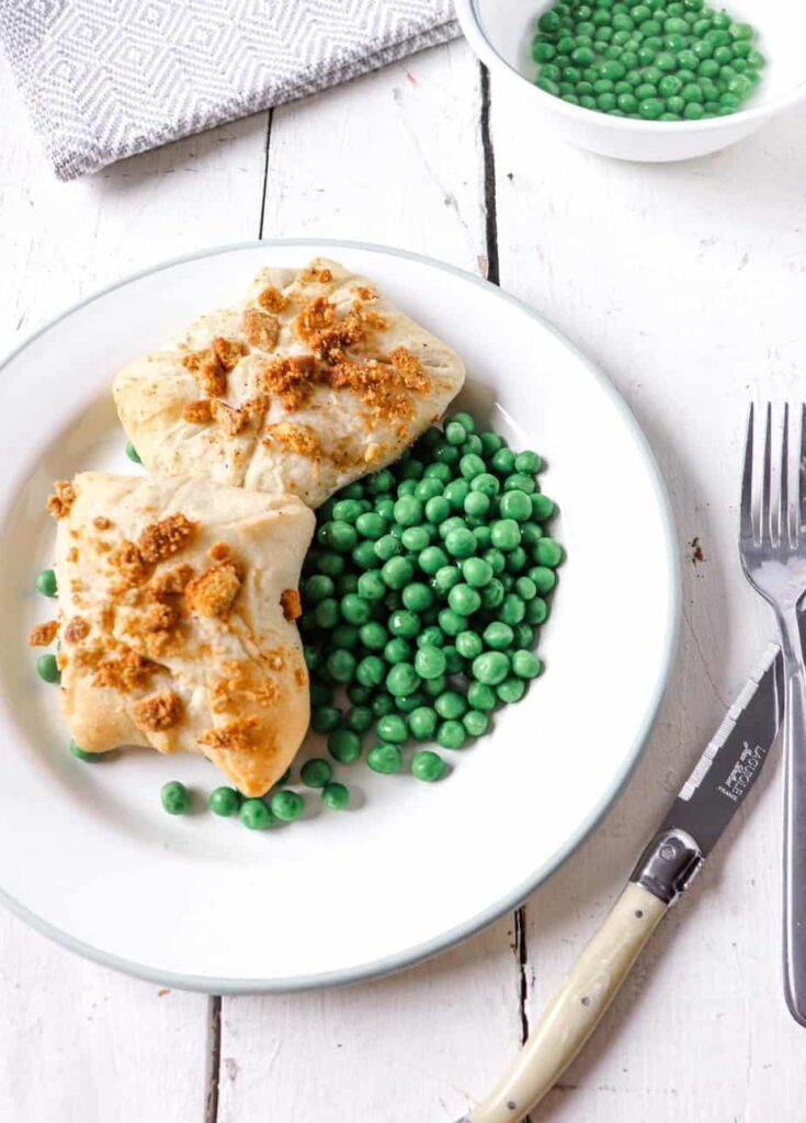 overhead shot of 2 pillows with peas and more peas in a bowl to the side