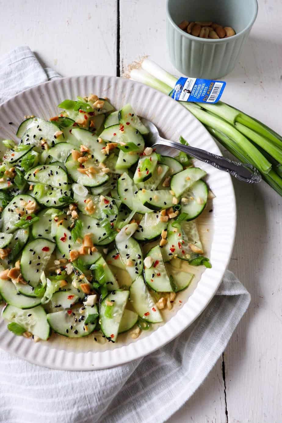 Thai cucumber salad with green onions and nuts