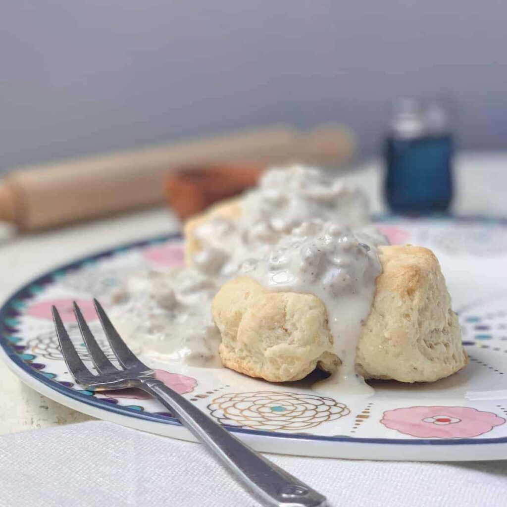 decorative plate of biscuits and gravy.