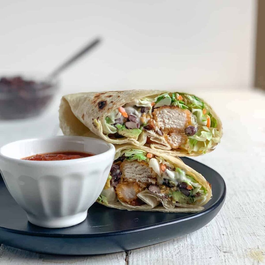 https://seasonandthyme.com/wp-content/uploads/2021/04/southwest-crispy-chicken-wrap-featured-1024x1024.jpg