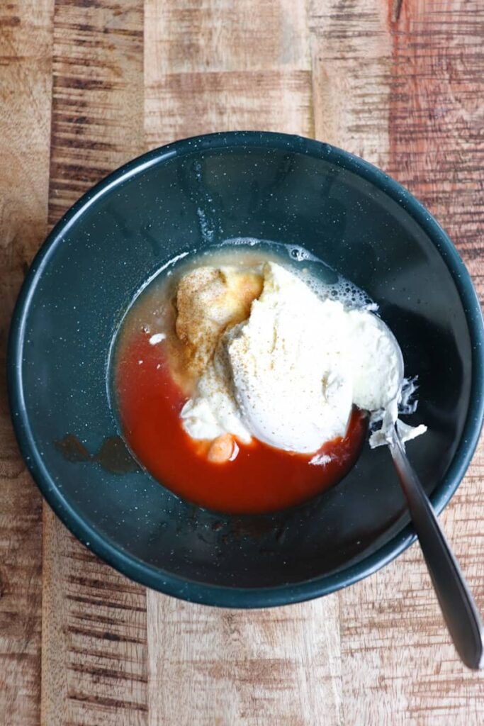 mexican chicken sauce ingredients in a green bowl