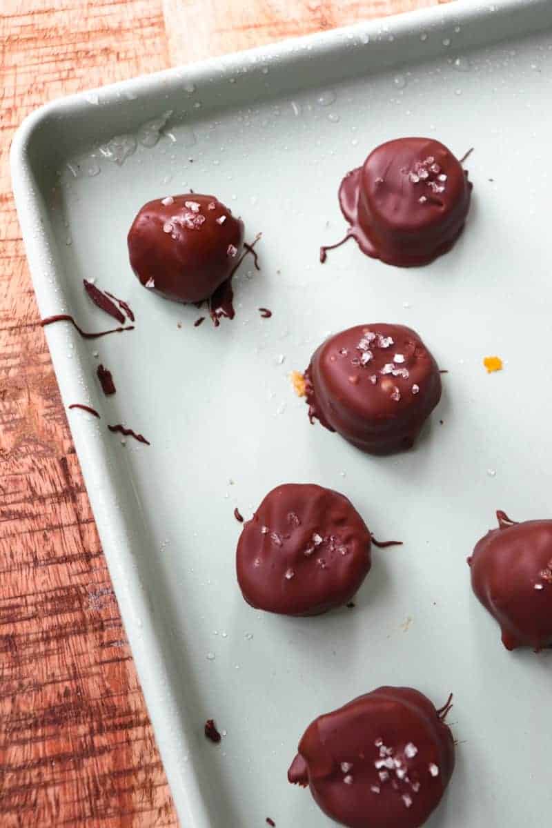 chocolate coated banana bites with a sprinkle of salt on top