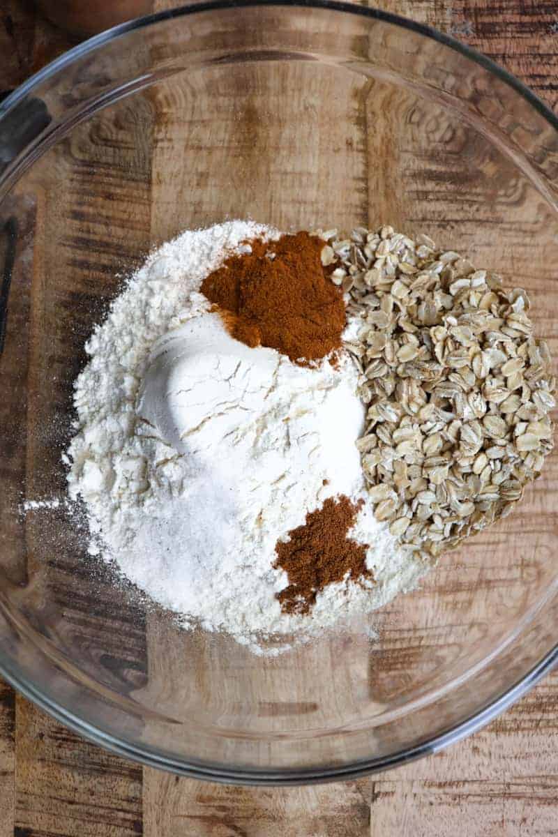 dry ingredients added to a glass bowl. 