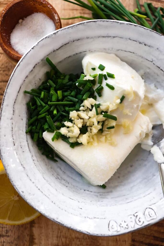 cream cheese filling ingredients in a white bowl