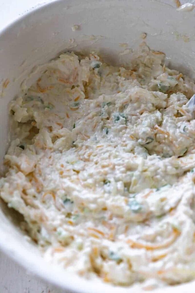 mixed jalapeno cream cheese in a white bowl shown close