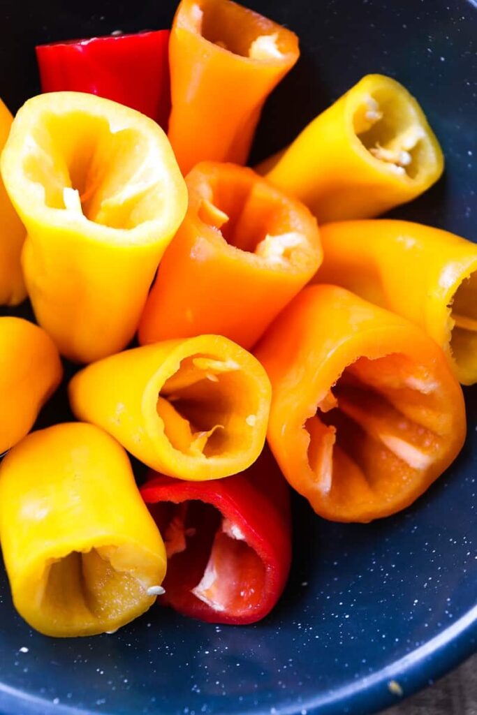 mini peppers with their tops cut off