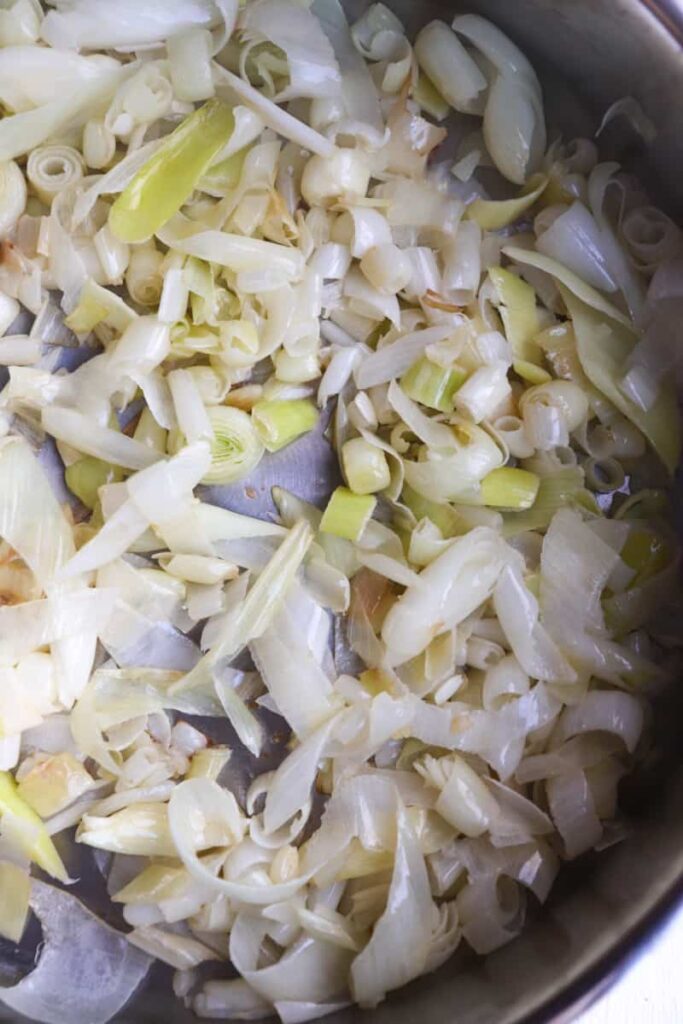 sauteed leeks and garlic in a pan