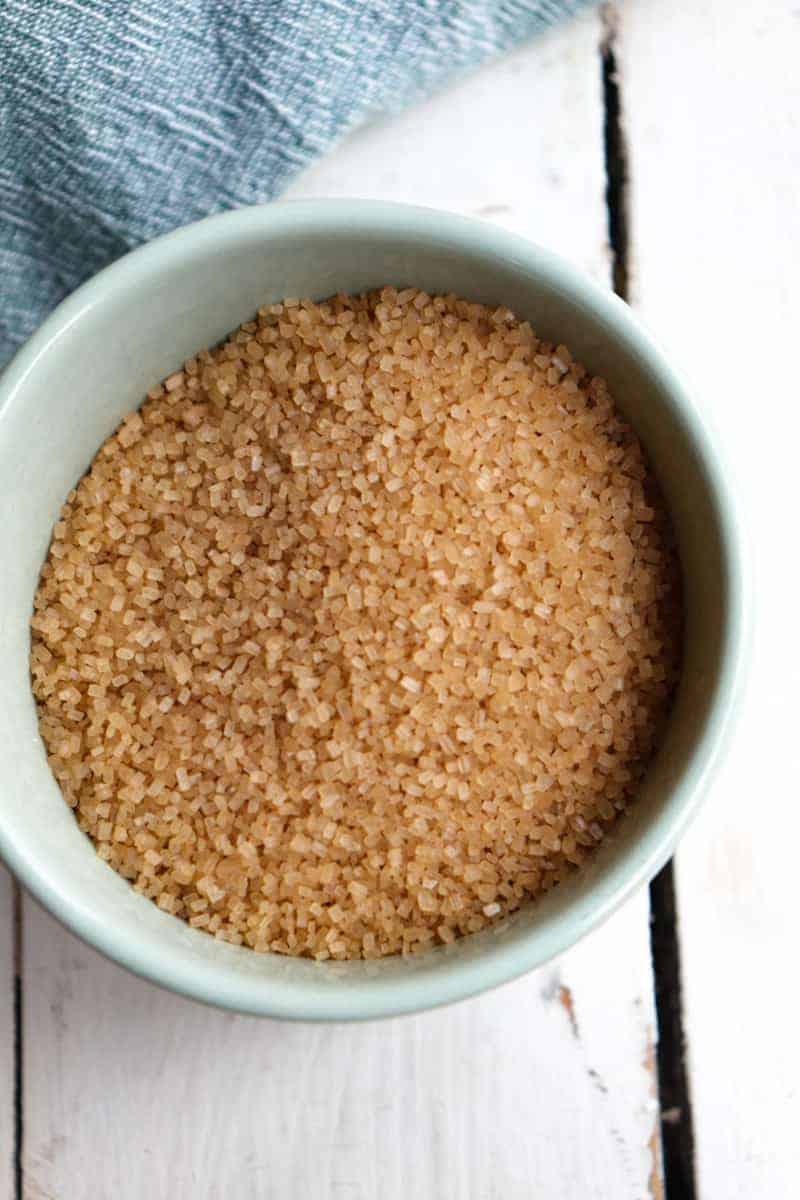 small mint colored bowl of demerara sugar