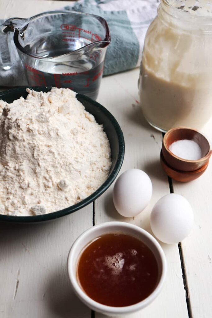 ingredients for bread on a white background