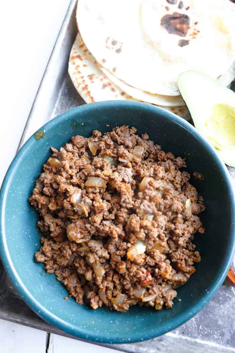 ground venison taco meat in green bowl