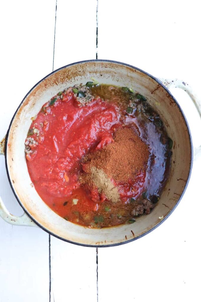 all ingredients for chili in a pot but not stirred
