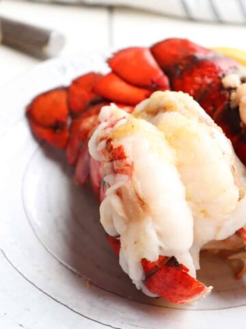 air fryer lobster tails on a plate