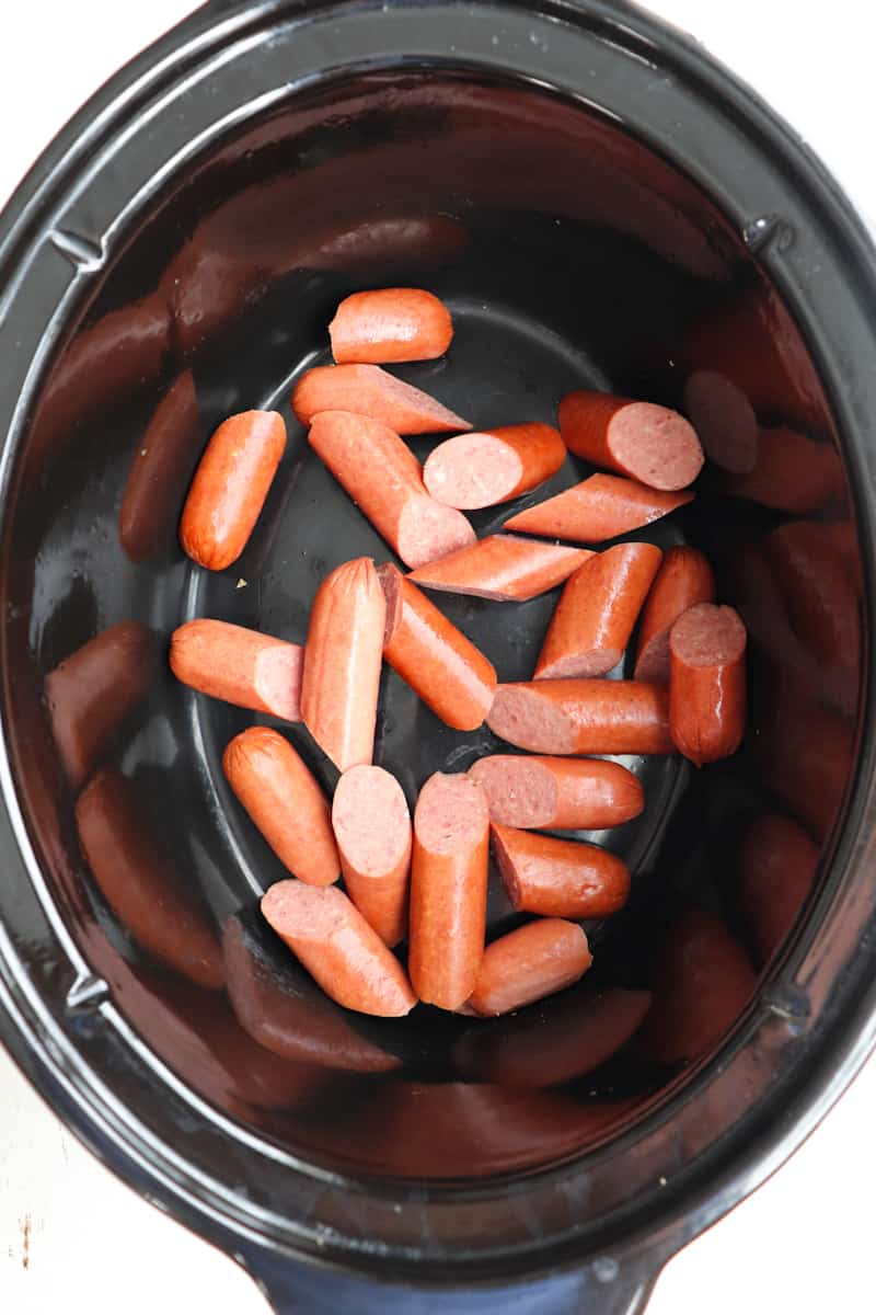 kielbasa pieces in crock pot.