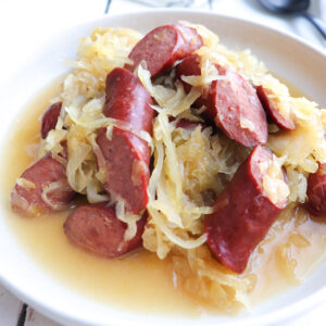 platter of finished kielbasa and sauerkraut