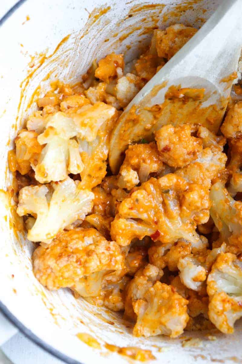 cauliflower florets coated in red curry paste