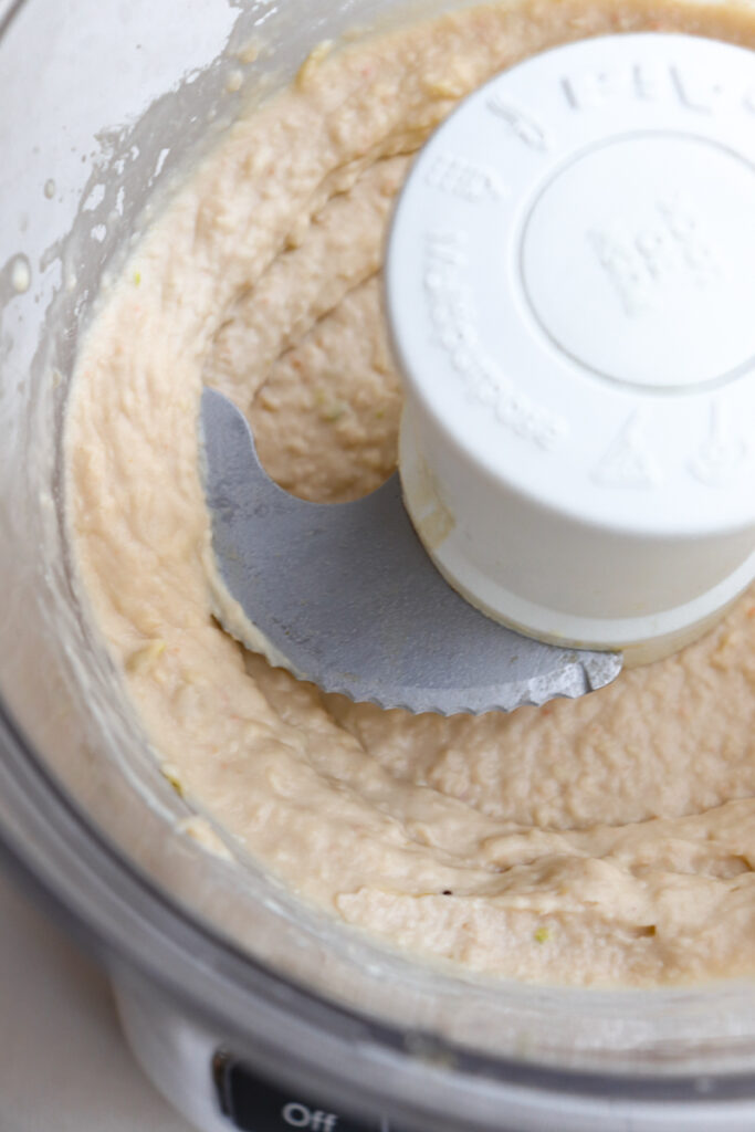 up close of hummus in food processor