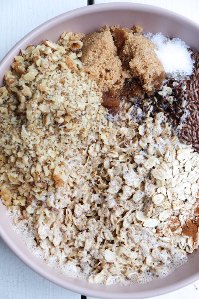 wet ingredients added to dry in a bowl