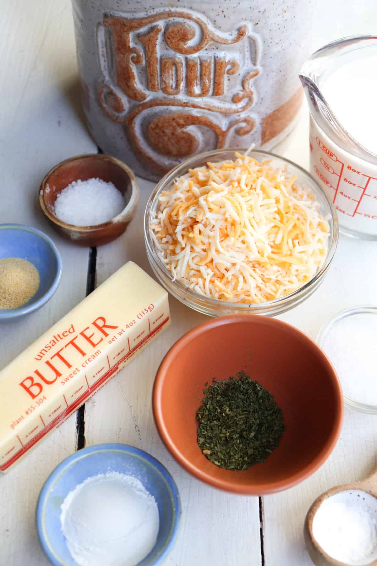 ingredients for cheese biscuits on a table.