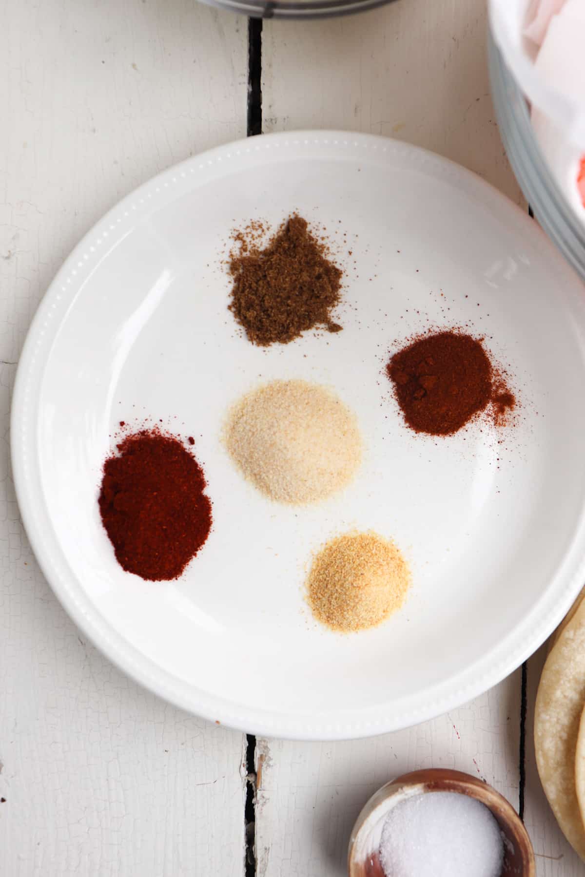 spices on a white plate.
