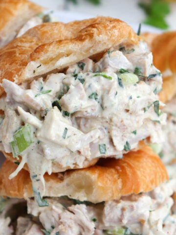 up close of chicken salad on a crescent roll