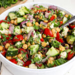 chopped mediterranean salad in a serving bowl.