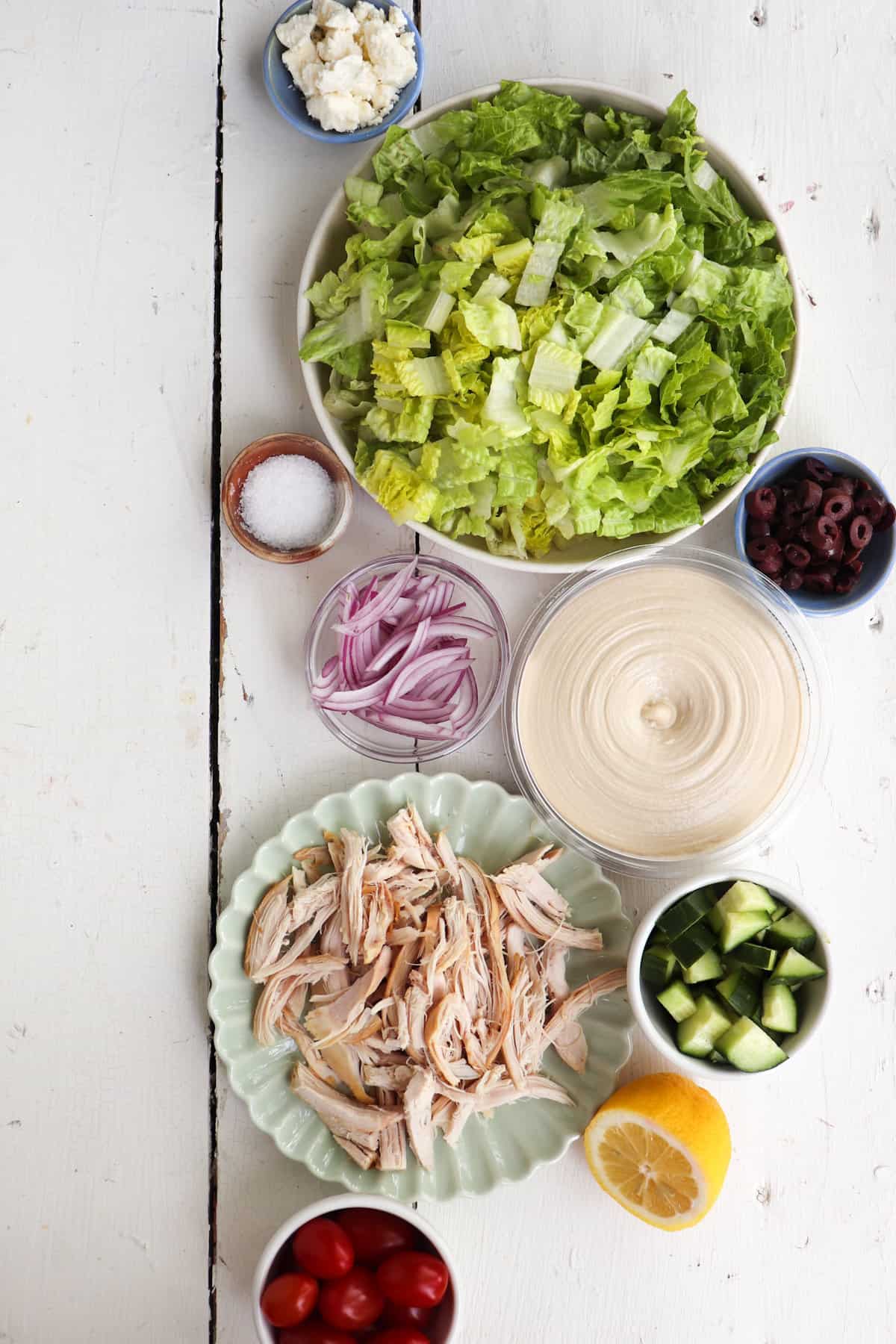 ingredients for gyros salad on a white background.