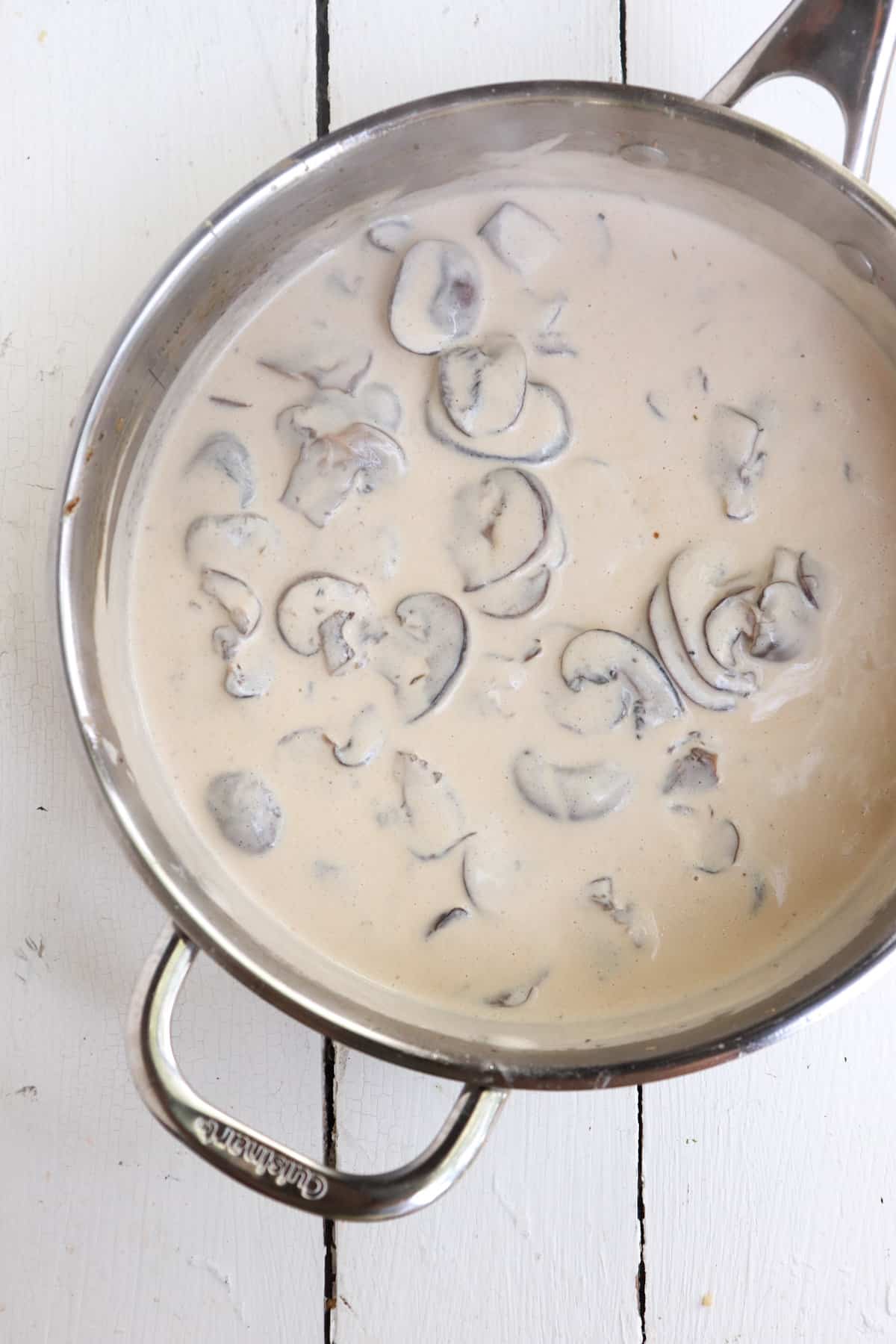 mushroom cream sauce in a skillet.
