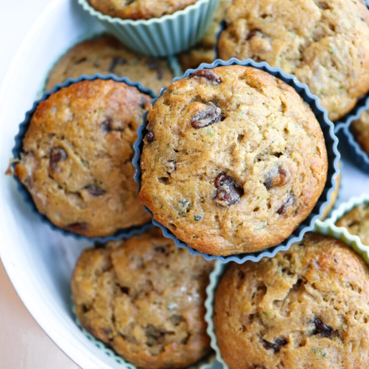 zucchini muffins with chocolate chips in silicone liners.