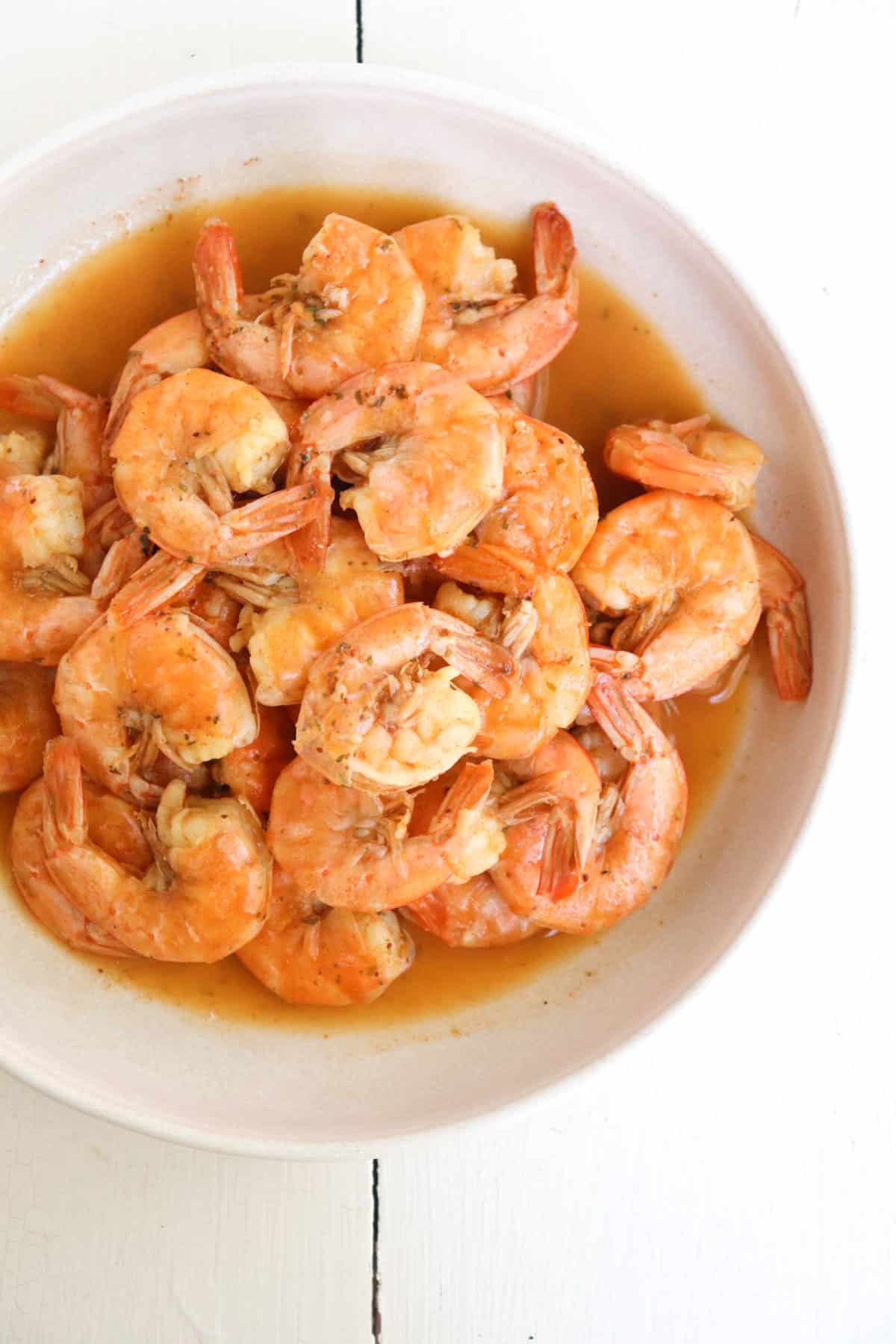 cooked cajun shrimp in a bowl.