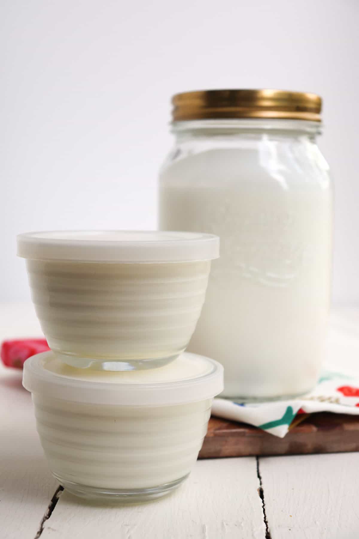 yogurt shown in different sized jars.