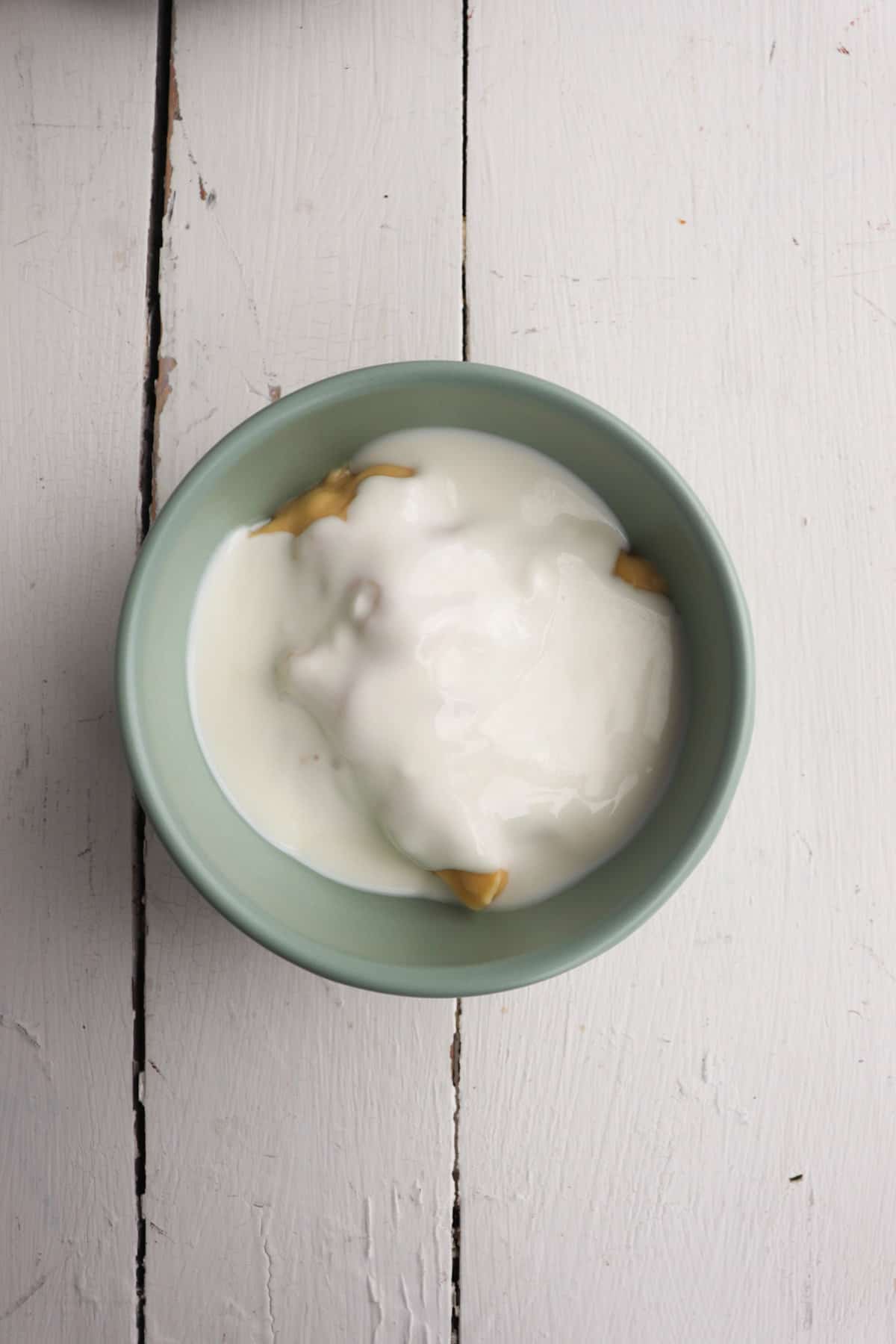 sour cream and cream soup in a small bowl.