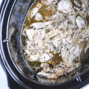 finished greek chicken thighs in slow cooker.