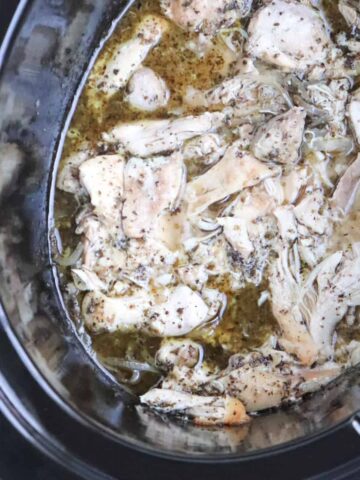 finished greek chicken thighs in slow cooker.