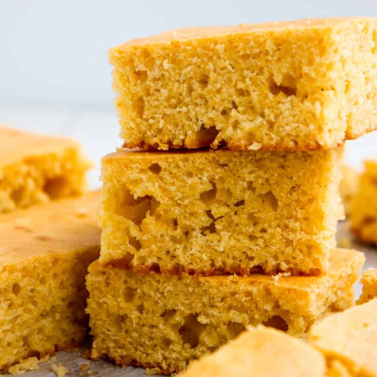 up close of stacked cornbread pieces.