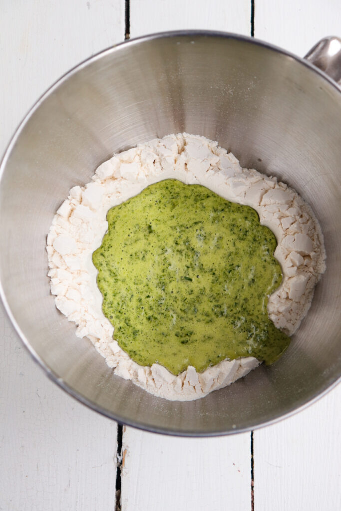 spinach wet ingredients added to flour.