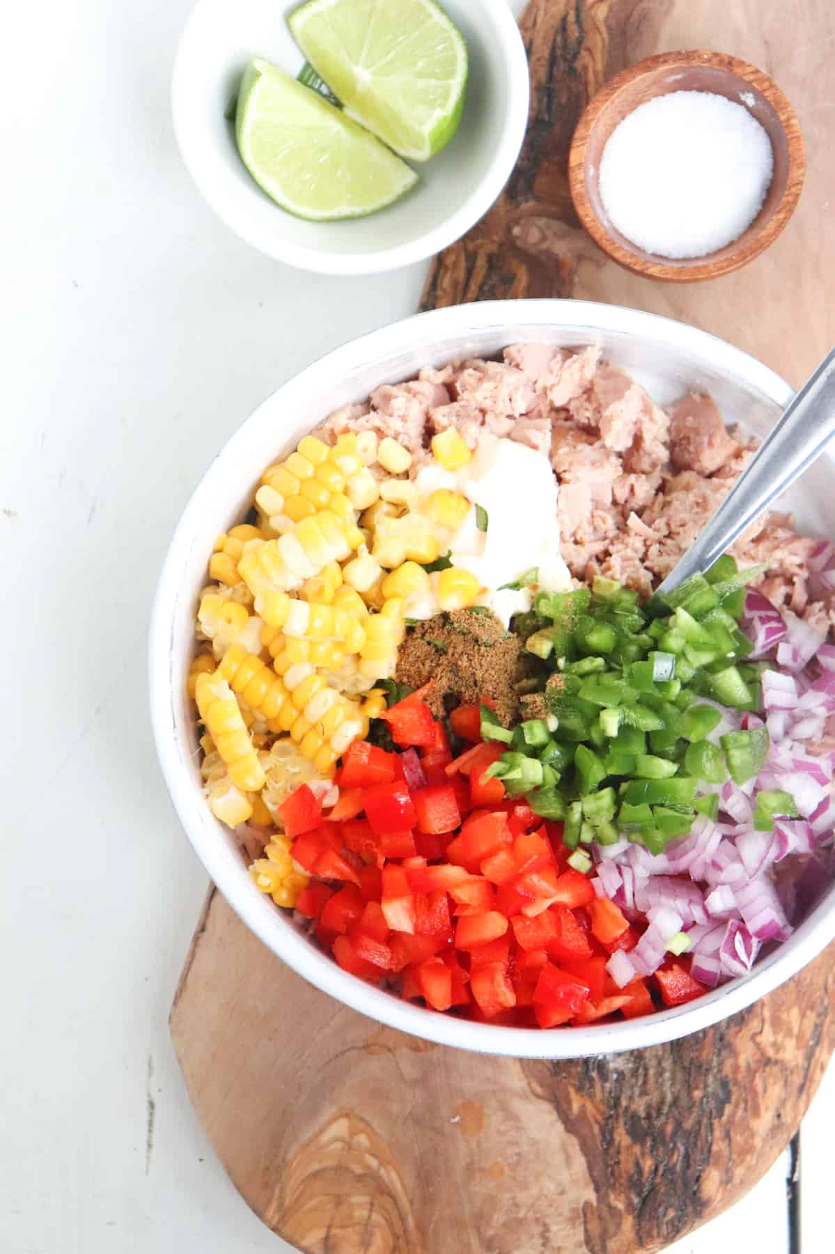 tuna salad ingredients in a bowl unmixed.