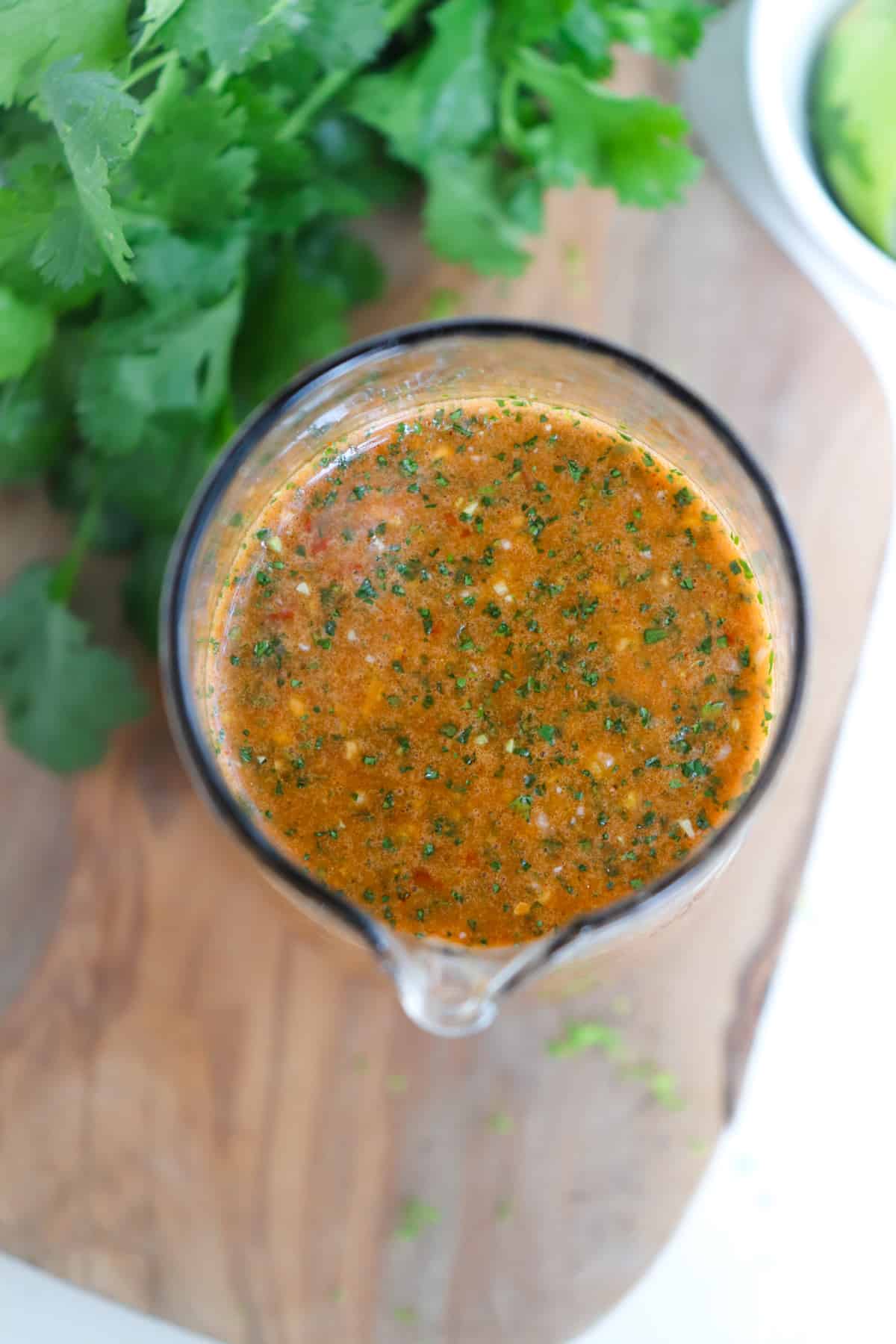 overhead shot of marinade with cilantro in the background.