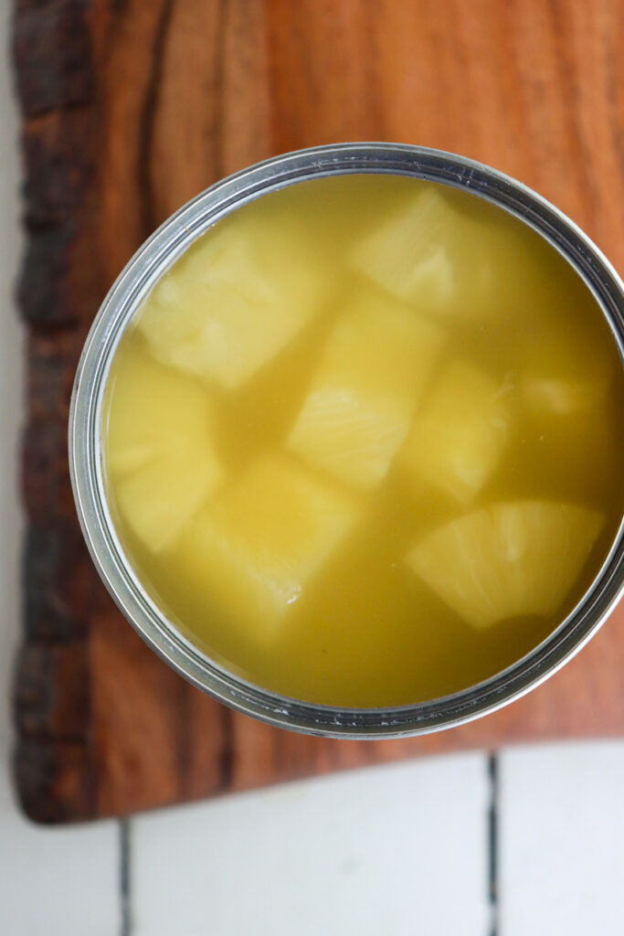 open can of pineapple chunks.