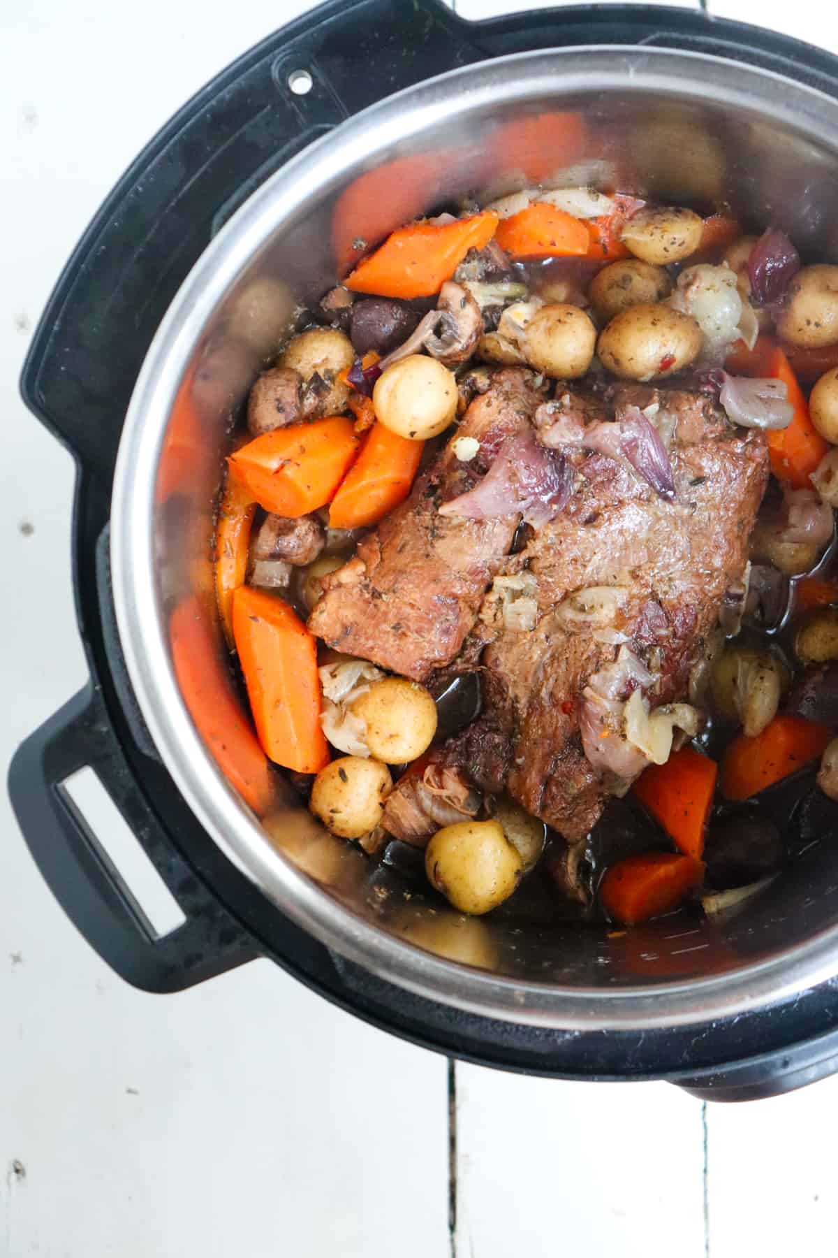 finished roast with veggies in instant pot.