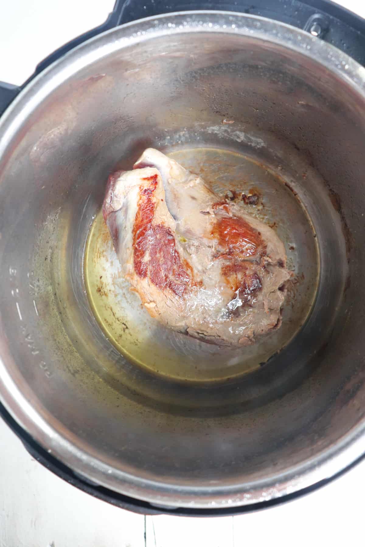 browned venison roast in instant pot.