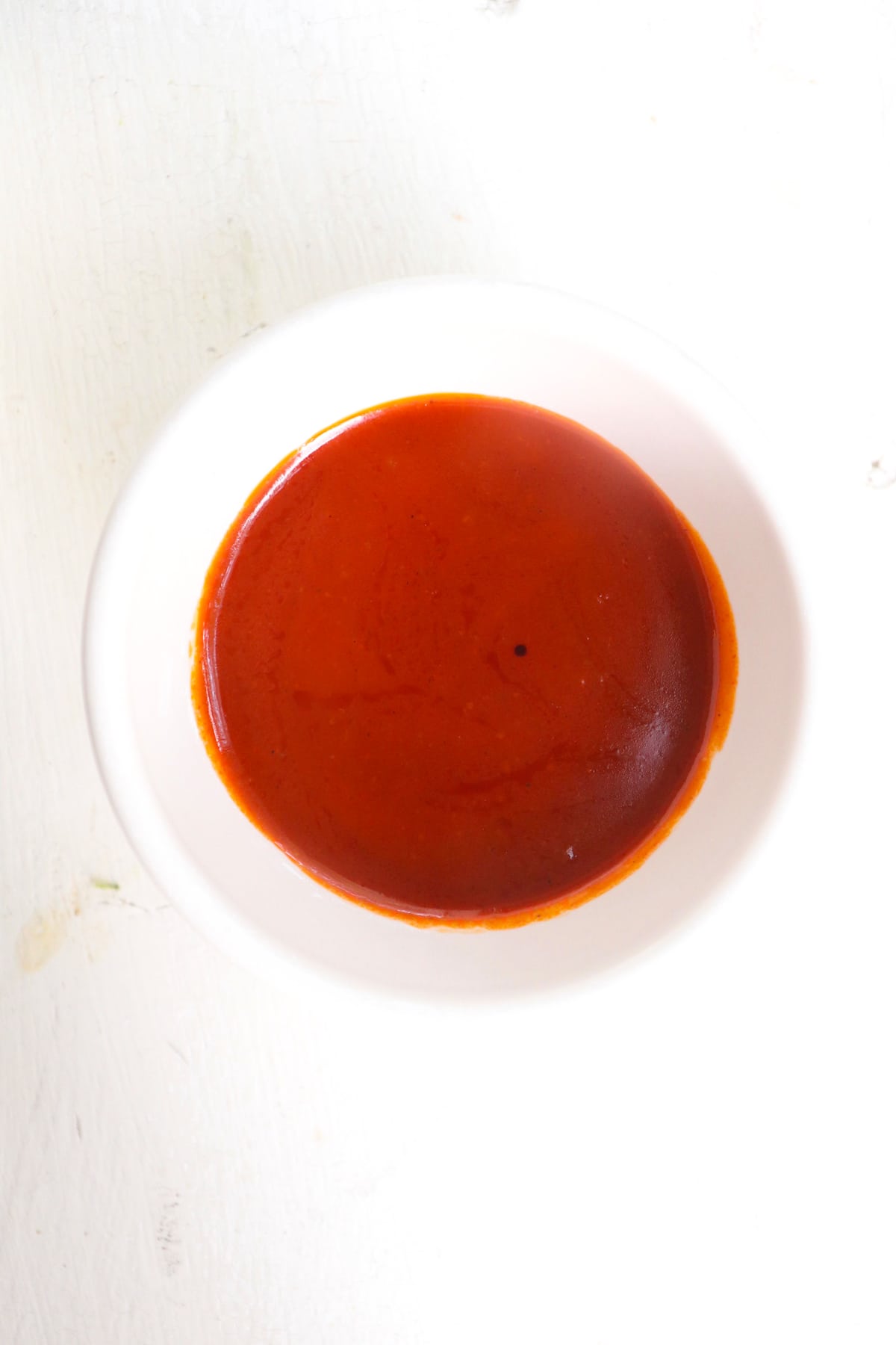 gochujang paste in a small white bowl.
