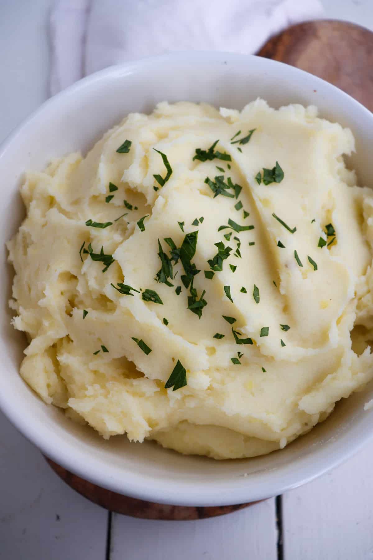 white bowl filled with mashed potatoes