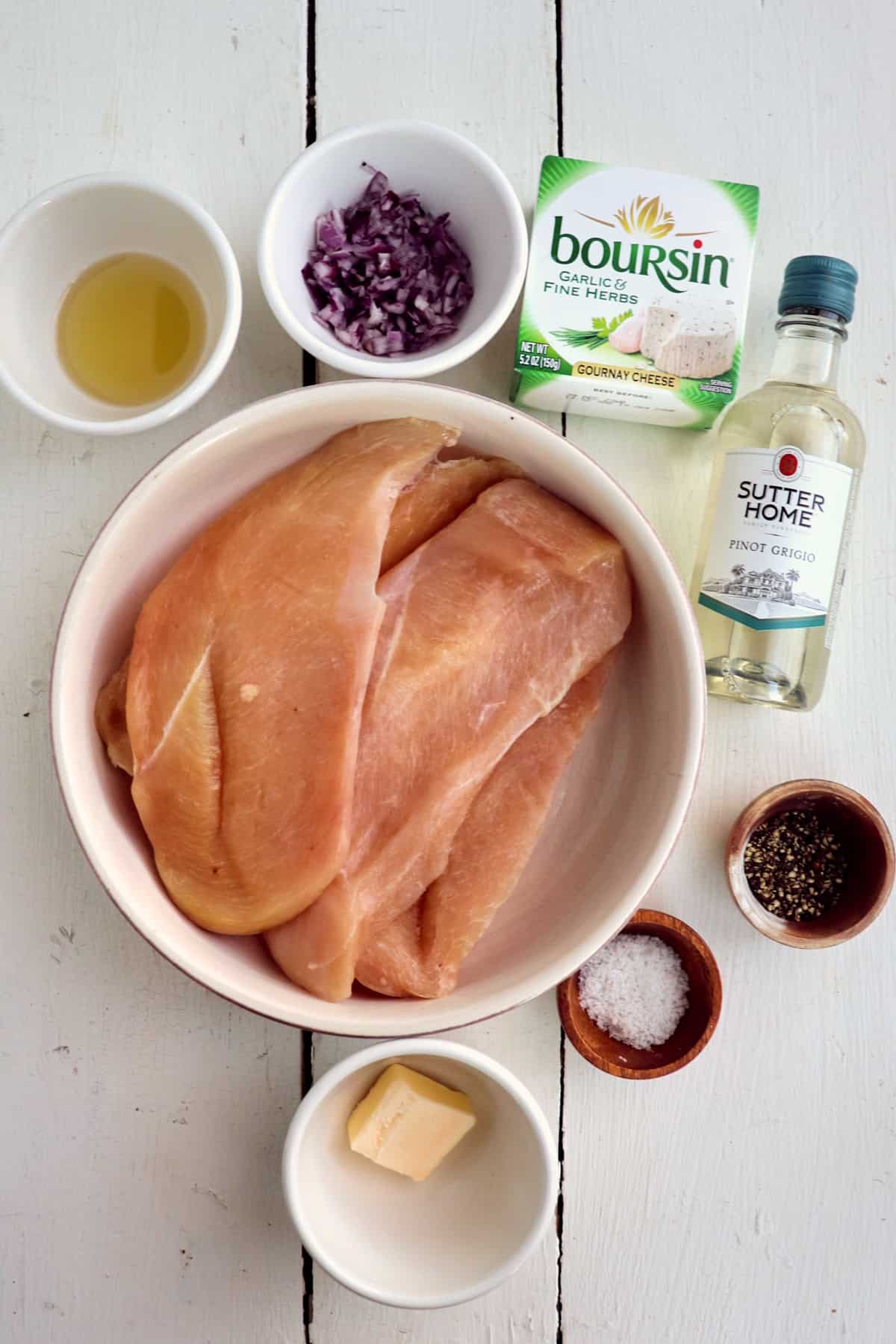 ingredients for boursin chicken on a white background.
