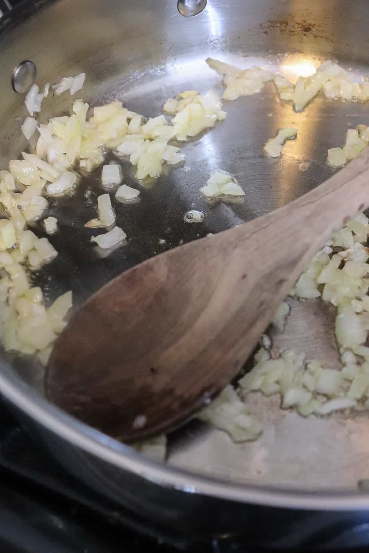 diced onions being sauteed.