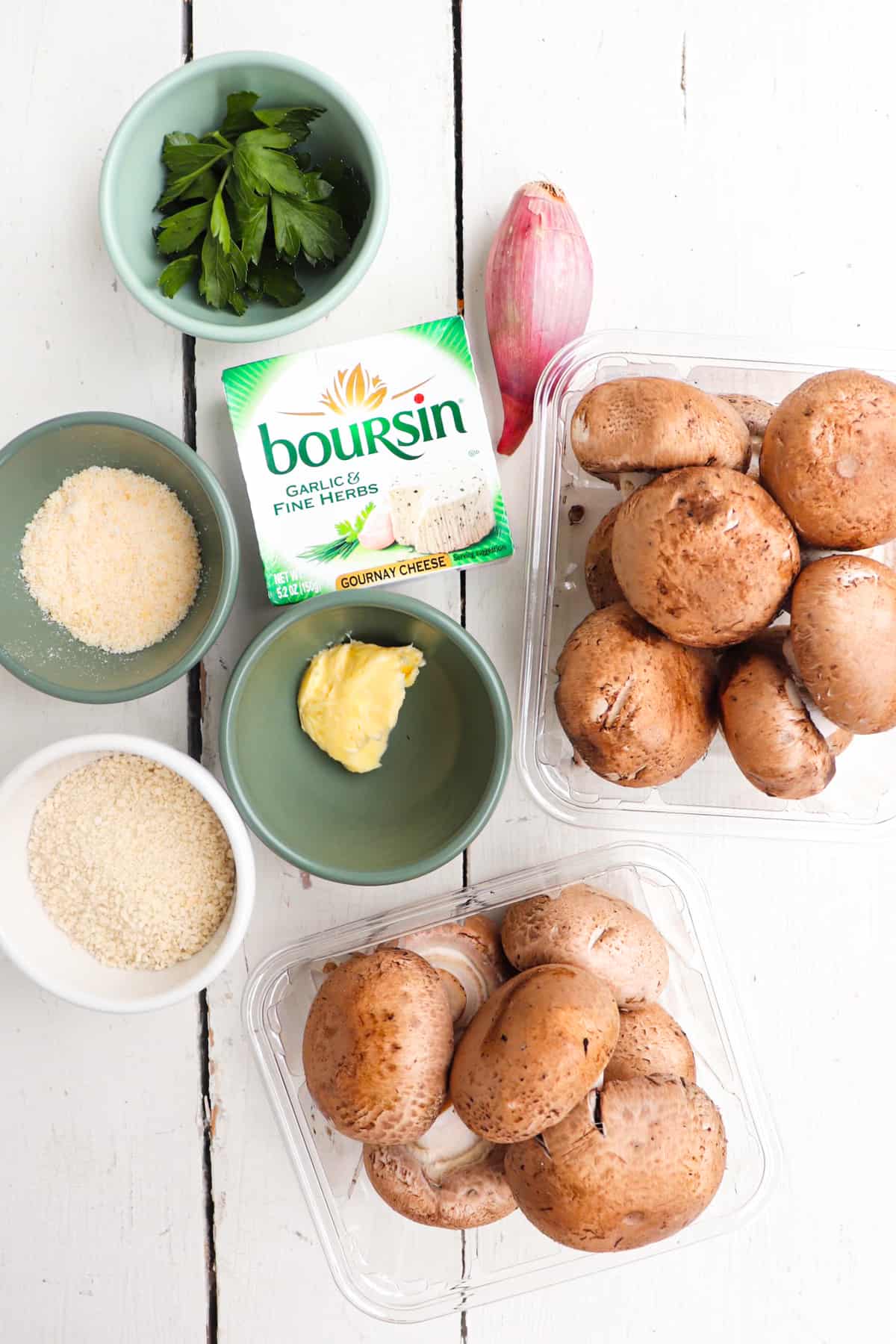 ingredients for boursin cheese stuffed mushrooms on a white background.