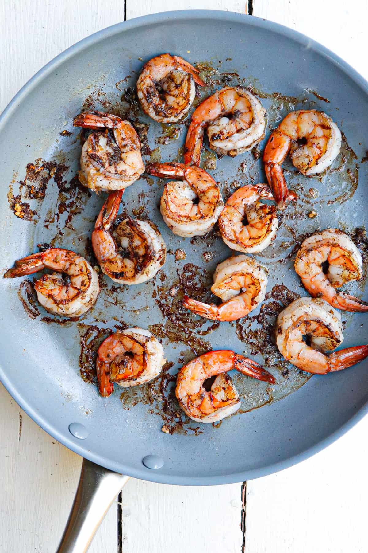 shrimp cooked in frying pan.