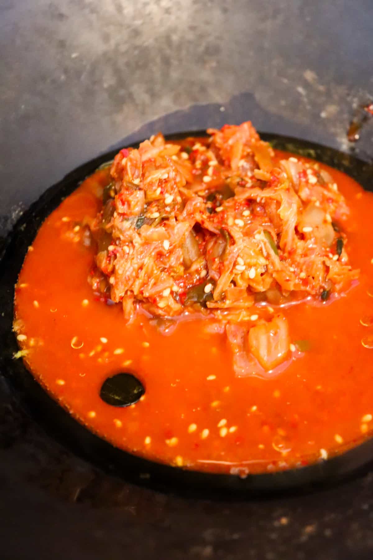 kimchi frying in wok.