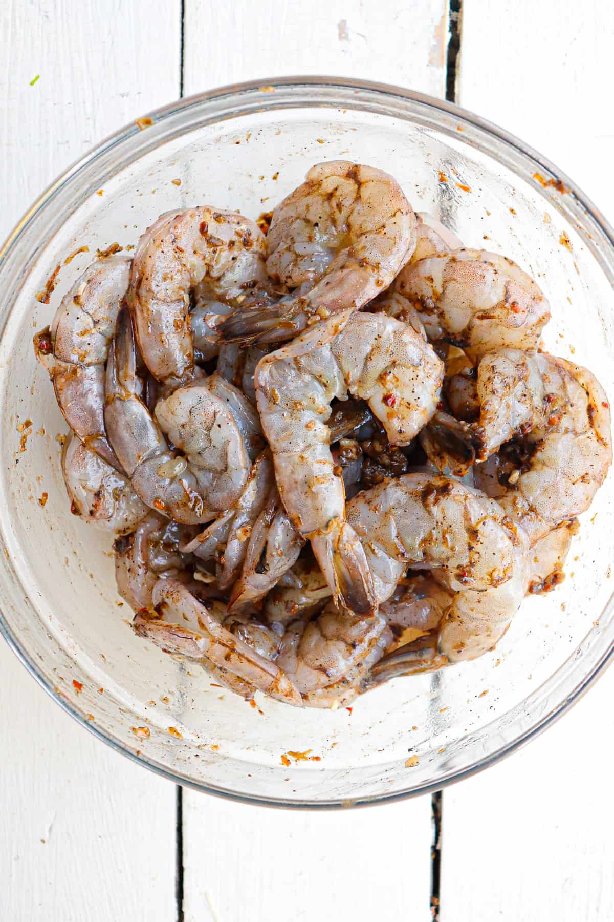 raw shrimp coated in jerk marinade.