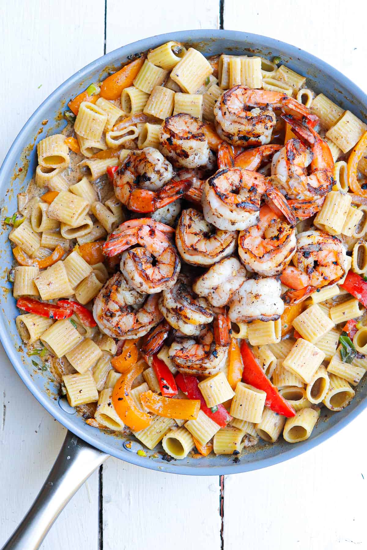 cooked shrimp added to the top of the pasta.